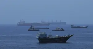 Iran strikes commercial ship in Strait of Hormuz in challenge to U.S.-Iran deal